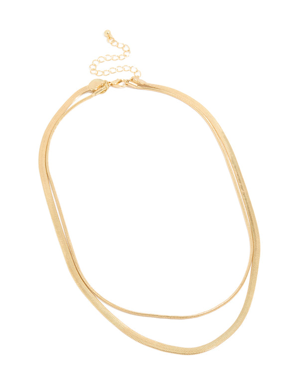 Elegant gold plated fine and snake chain layered necklace close up view