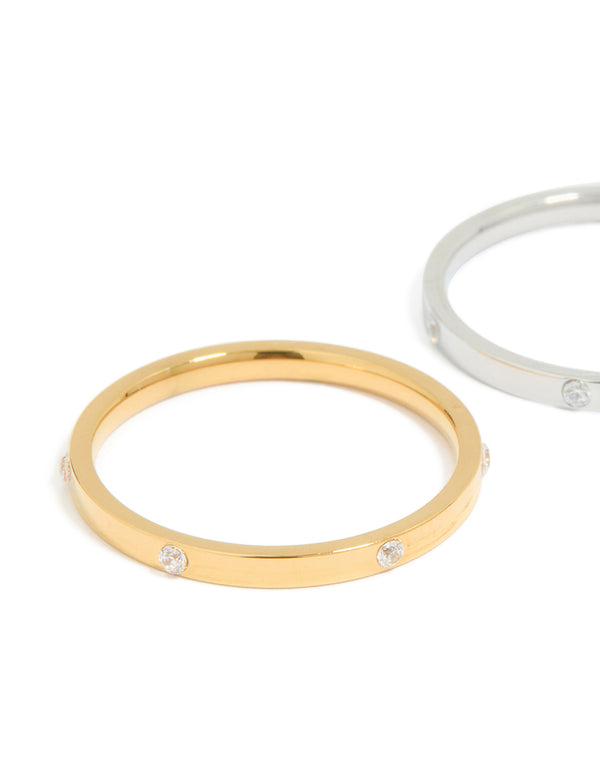 Crafted from waterproof mixed metals plated stainless steel with cubic zirconia dot accents, skinny rings in gold and silver 2-pack close up view