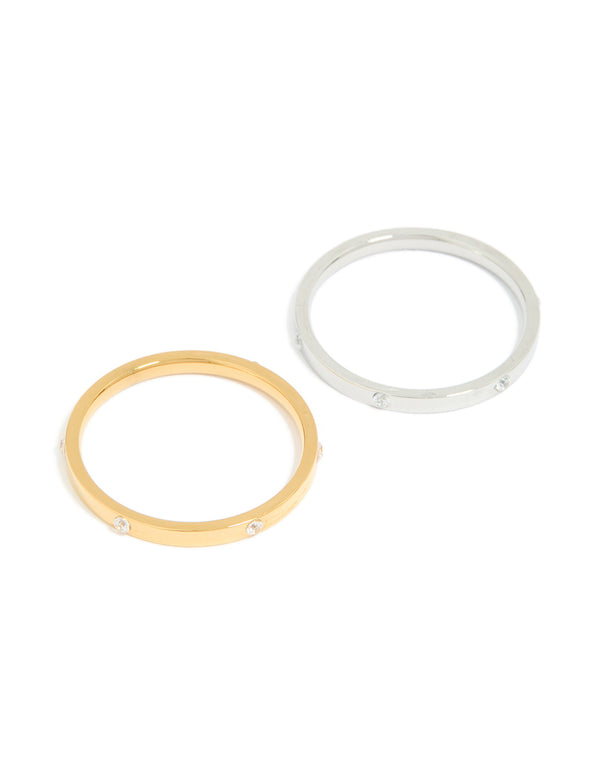 Showcasing waterproof mixed metals plated stainless steel skinny cubic zirconia dot rings in a 2-pack with gold and silver tones front view