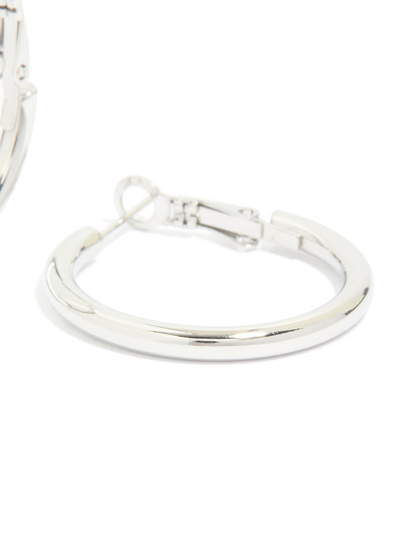 Showcasing waterproof stainless steel, these hoop earrings deliver bold statement style in silver post detail view