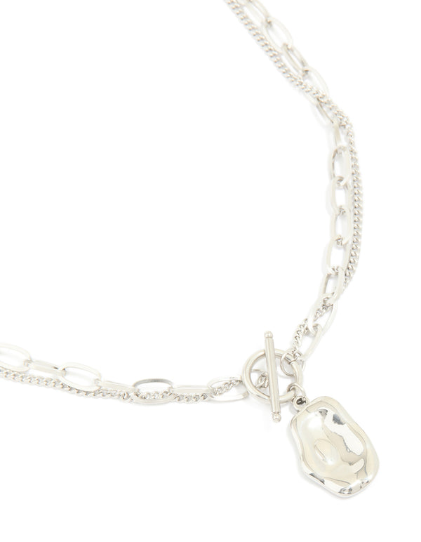 Discover this waterproof stainless steel molten pendant and chain layered necklace in silver close up view