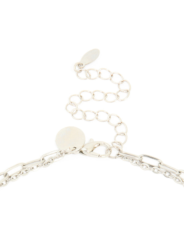 Showcasing waterproof stainless steel diamante and freshwater pearl chain layered necklace with in silver ivory clasp detail view
