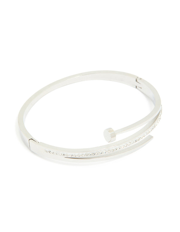 Showcasing a waterproof stainless steel cubic zirconia nail hinge bangle in silver with clear stones and statement styling front view
