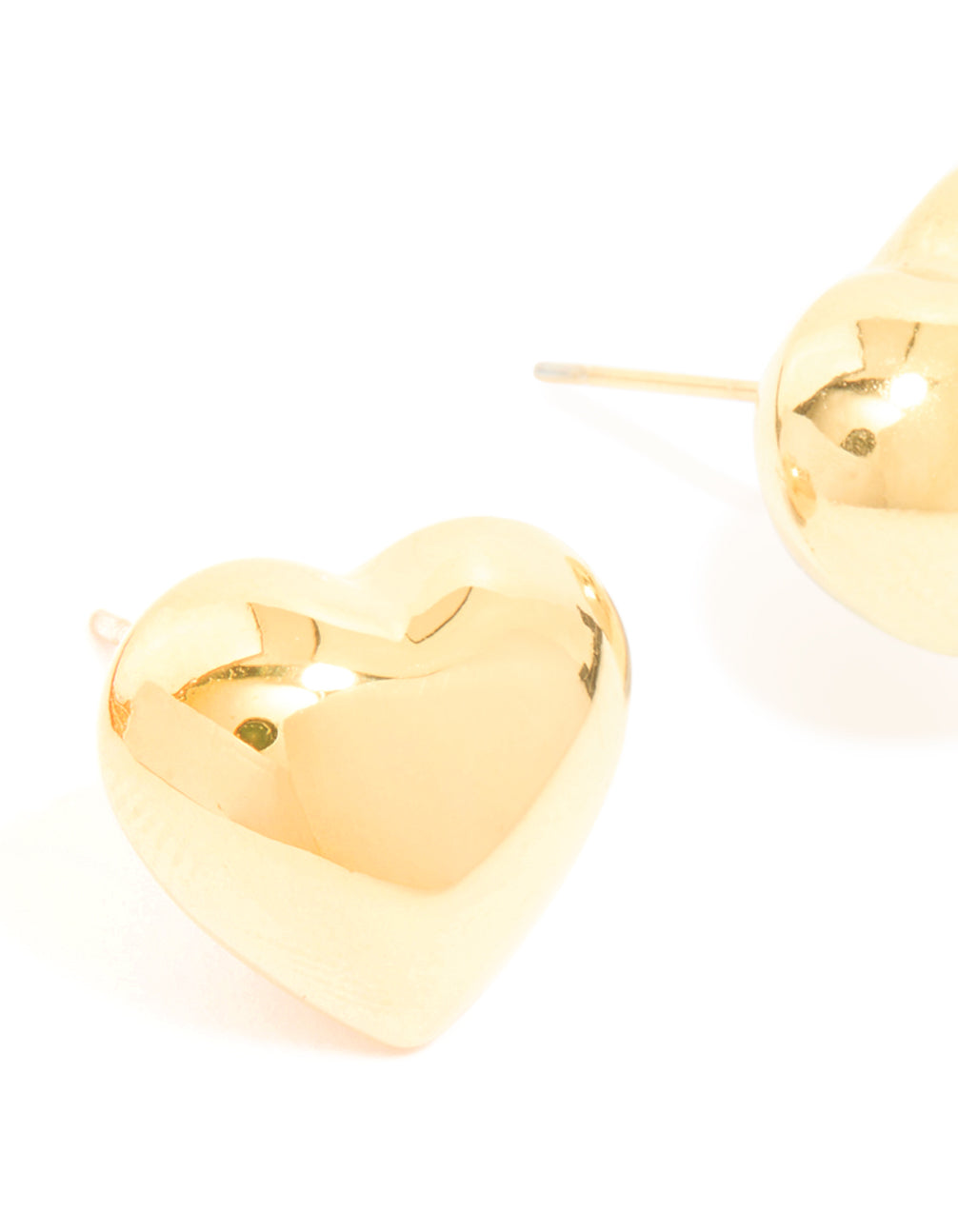 Crafted from waterproof gold plated stainless steel, these puffy heart stud earrings close up view