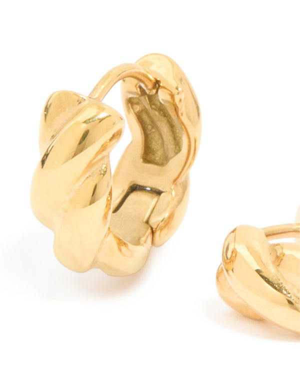 Featuring waterproof gold plated stainless steel plaited detail huggie earrings in close up view