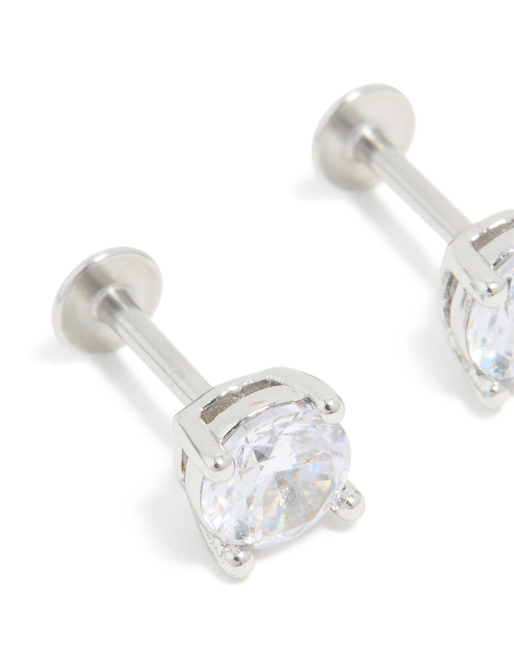 Showcasing titanium cubic zirconia flat back studs with sparkling stones in silver close up view