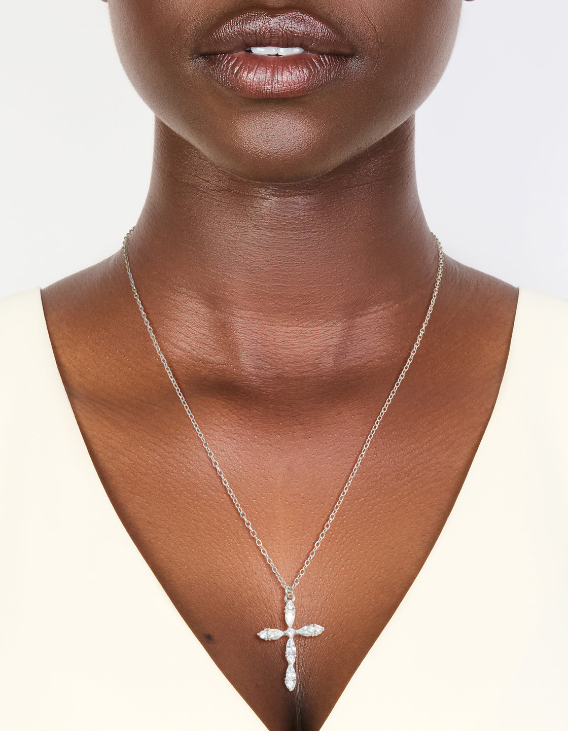 Discover a waterproof stainless steel multi cubic zirconia large cross necklace featuring statement style in silver and clear on neck view