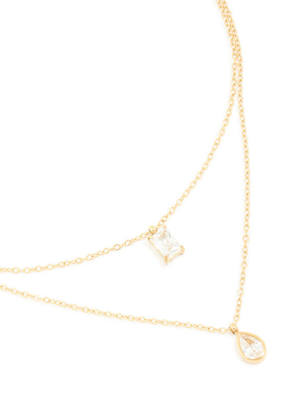 Showcasing a waterproof gold plated stainless steel layered necklace with cubic zirconia close up view