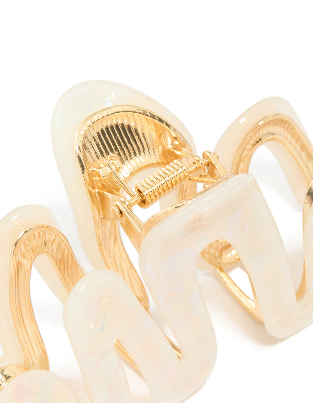Designed with pearl accents in gold and ivory claw clip detail view