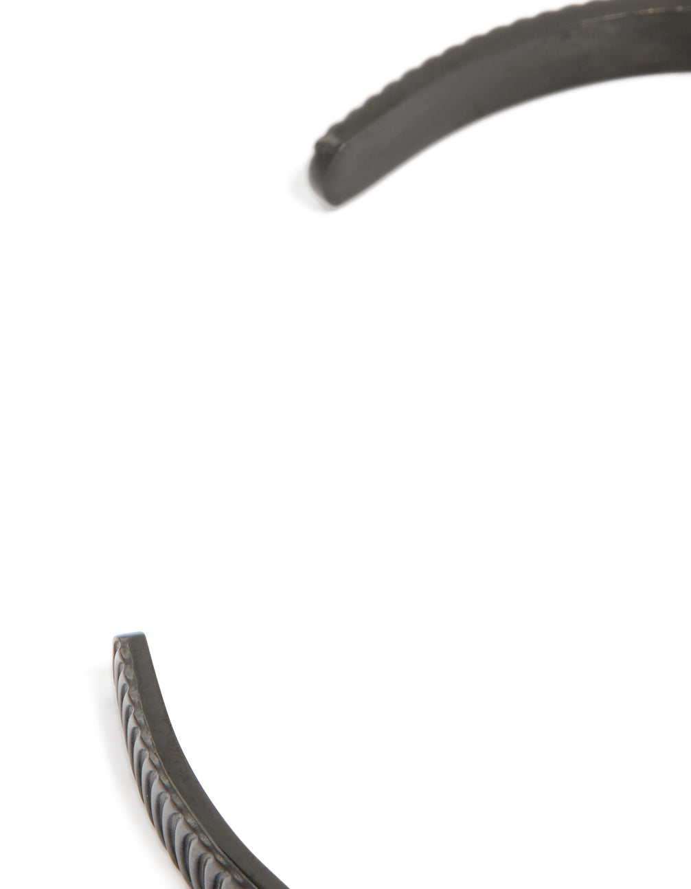 Crafted from waterproof black stainless steel, this mens detailed wrist cuff closure detail view