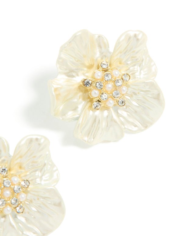 Detailed statement floral earrings in gold plated material featuring pearl and diamante accents with ivory tones post detail view