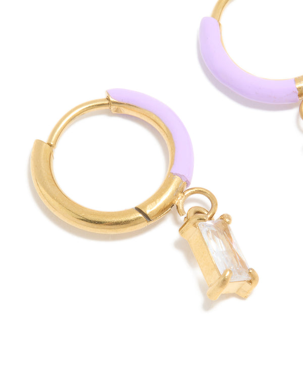 Highlighting waterproof statement huggie earrings with crystal featuring cubic zirconia and purple enamel, crafted from stainless steel and gold plated close up view