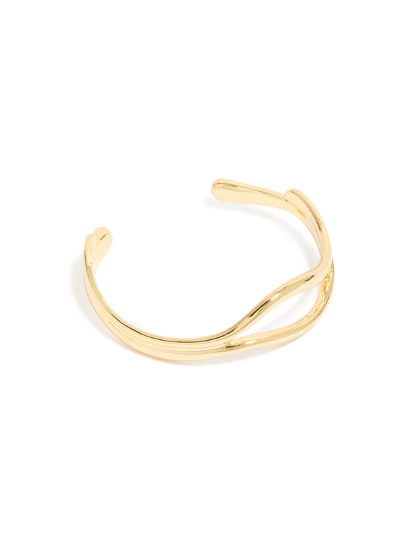 Stunning gold plated organic open wave wrist cuff in a front view