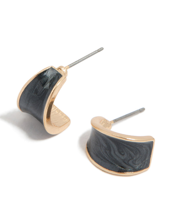 Showcasing curved shiny open hoop earrings in statement style with gold and black colors front view