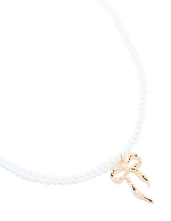 Gold Pearl & Bow Necklace