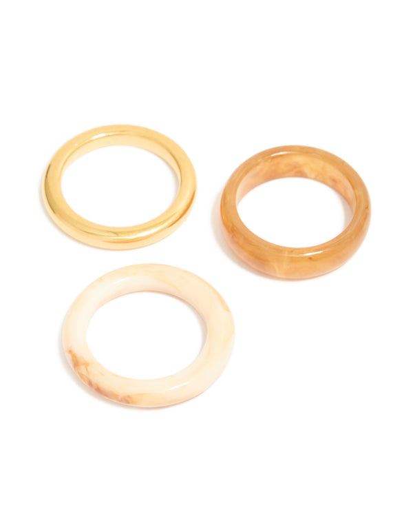 Featuring waterproof gold plated stainless steel and marbled stacking rings 3-pack front view