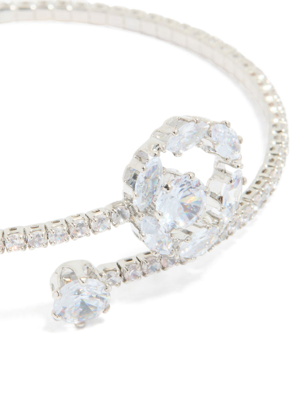 Highlighting a silver cubic zirconia open circle wrist cuff bracelet close up view