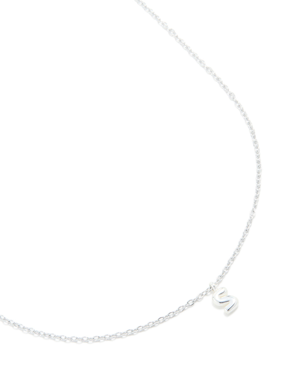 Crafted from waterproof stainless steel with initial bubble letter S in silver, this dainty necklace features a close up view