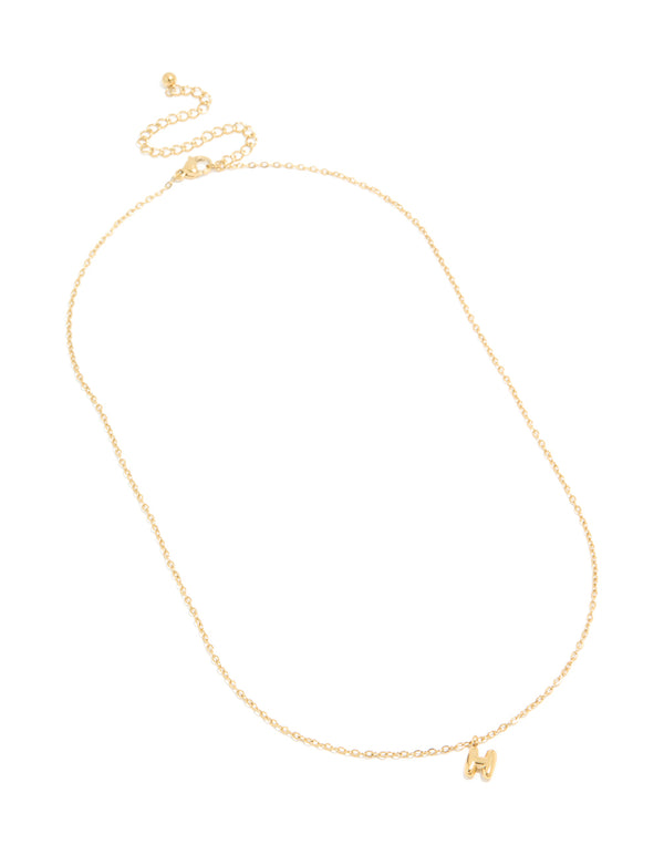 Displaying a waterproof bubble letter H necklace in gold plated stainless steel with initial pendant and adjustable chain front view