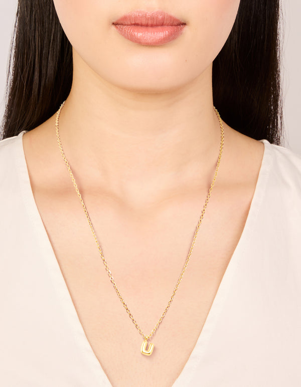 Discover this waterproof bubble letter U initial pendant necklace crafted from gold plated stainless steel with a dainty style on neck view
