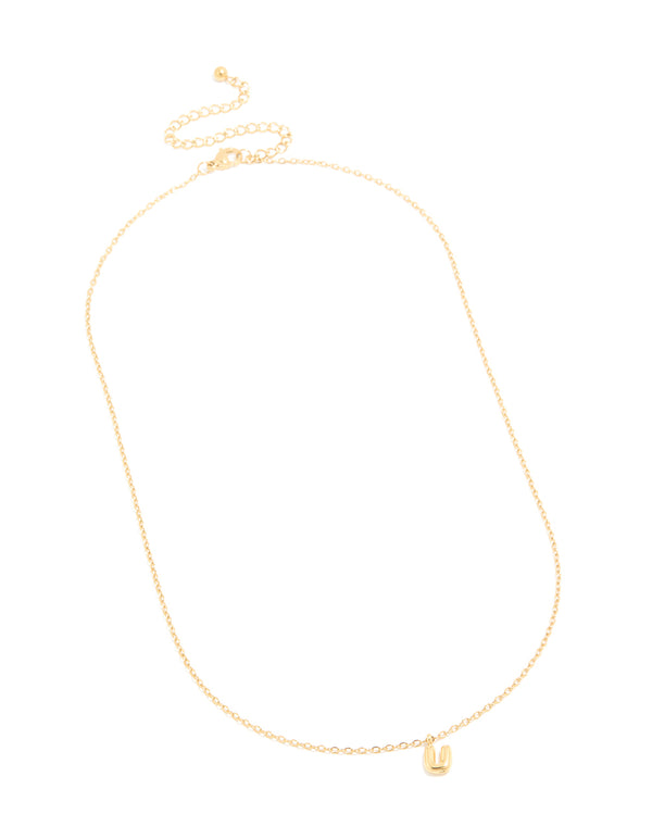 Explore this waterproof bubble letter U initial pendant necklace made from gold plated stainless steel with a dainty style front view