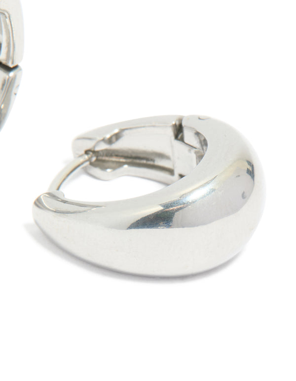 Presenting surgical steel bold oval hoop earrings in silver post detail view
