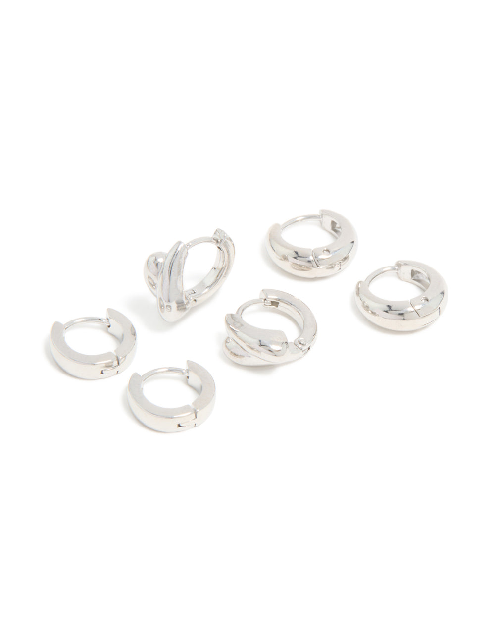 Discover chunky huggie earrings crafted from waterproof stainless steel in silver, available as a 3-pack front view