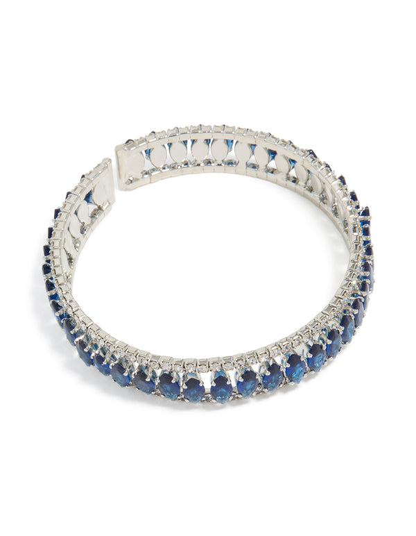 Crafted from silver with mini blue diamantes, this wrist cuff bangle displays its full structure in front view