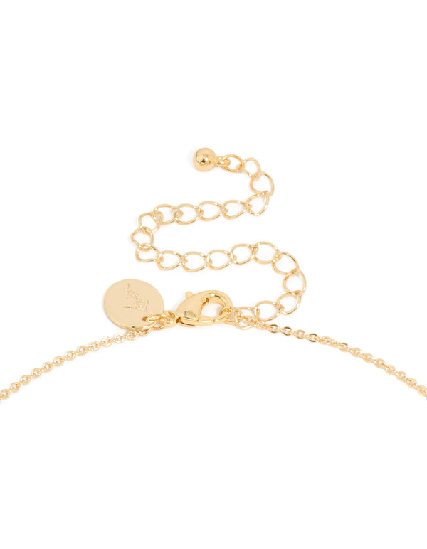 Detailed view of gold plated brass cubic zirconia letter K tag necklace with initials featuring pendant clasp detail view
