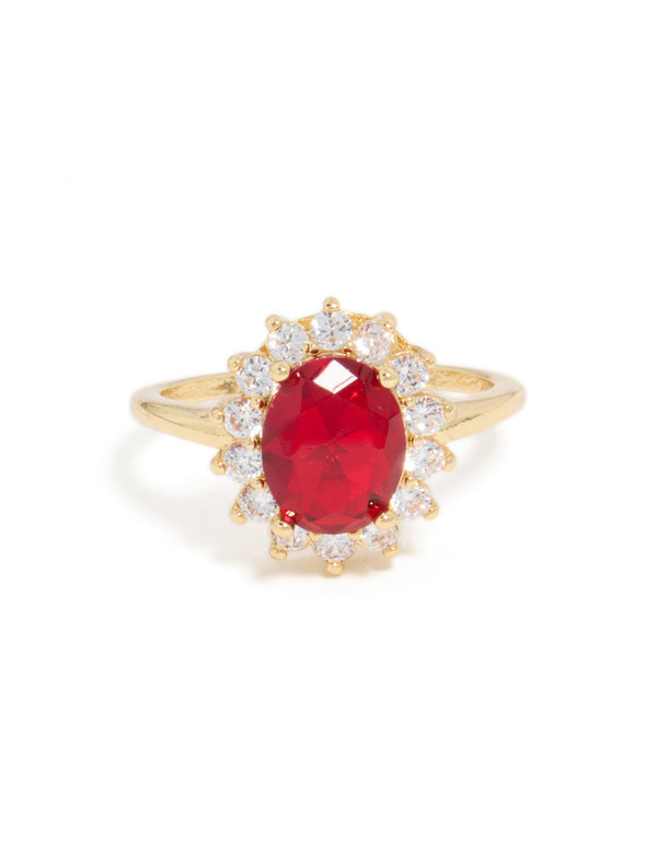 Stunning gold plated oval red cubic zirconia ring in floral with prong setting close up view