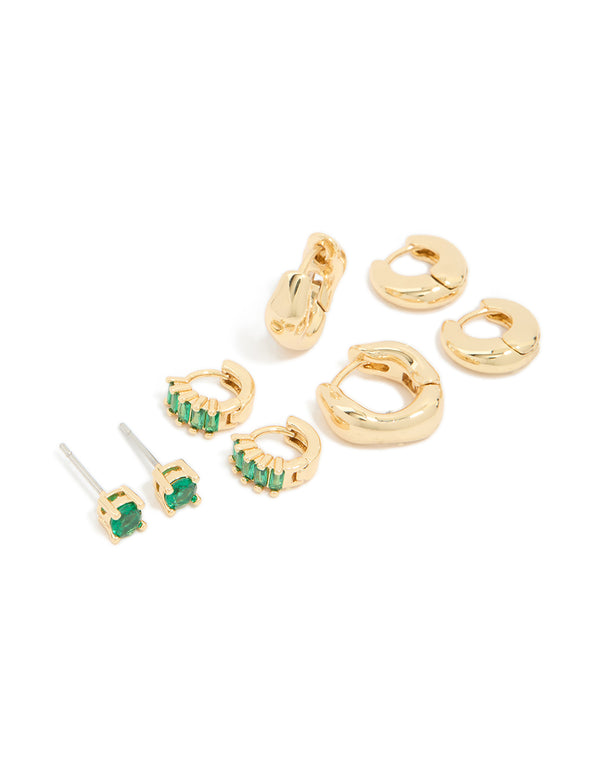 Showcasing chunky gold plated brass emerald cubic zirconia huggie and stud earrings in a 4-pack with green crystal accents front view