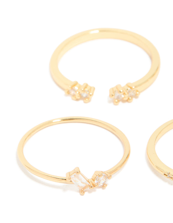 Showcasing gold plated open rectangular cubic zirconia rings in a 5-pack close up view