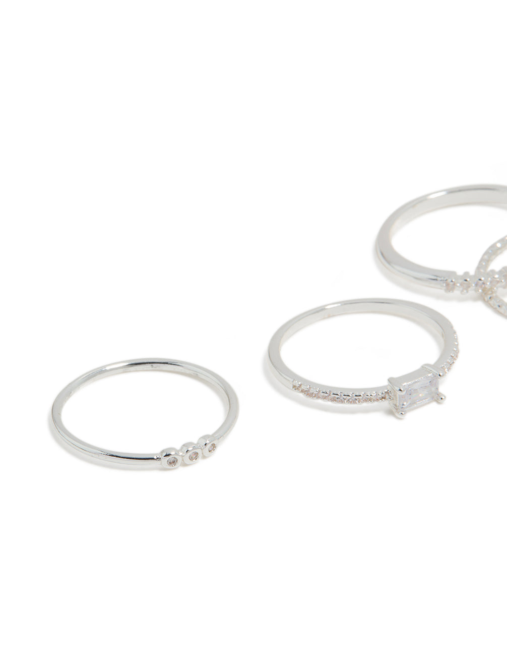 Showcasing silver plated cubic zirconia square bezel rings 4-pack close up view