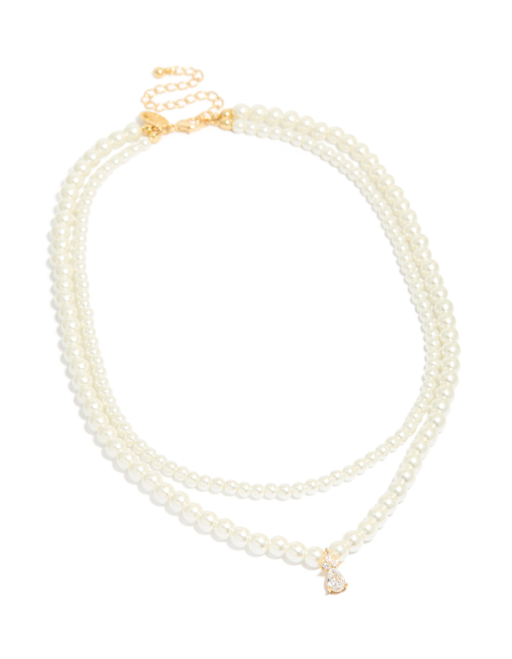 Showcasing a gold plated cubic zirconia and pearl drop layered necklace front view