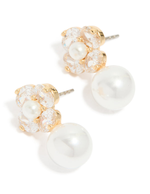Gold plated cubic zirconia flower and pearl drop earrings featuring clear and ivory tones front view