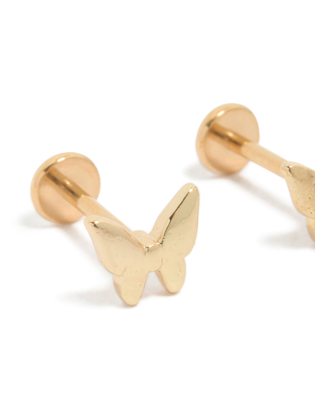 Showcasing gold plated titanium butterfly studs with flat back in a close up view
