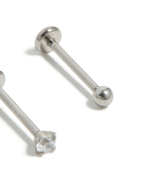 Crafted from titanium, these cubic zirconia threadless flat back nose studs feature ball accents in silver with a dainty styling detail view