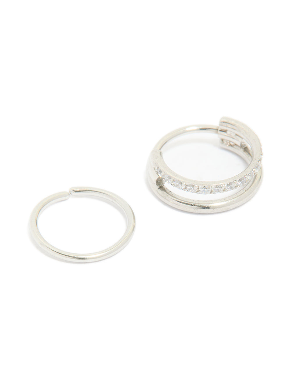 Featuring surgical steel cubic zirconia hinged and simple nose rings in a 2-pack with diamond accents and statement style front view