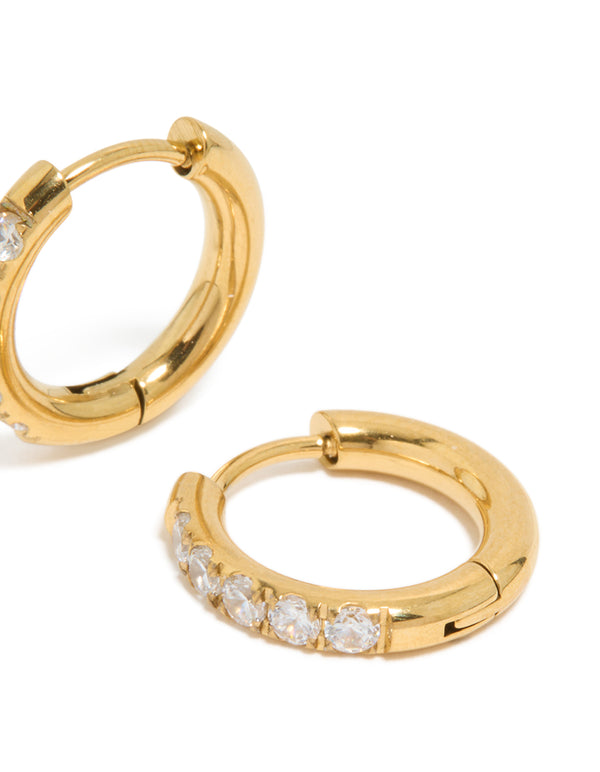 Crafted from stainless steel, these chunky gold plated hoop earrings feature cubic zirconia inlay post detail view