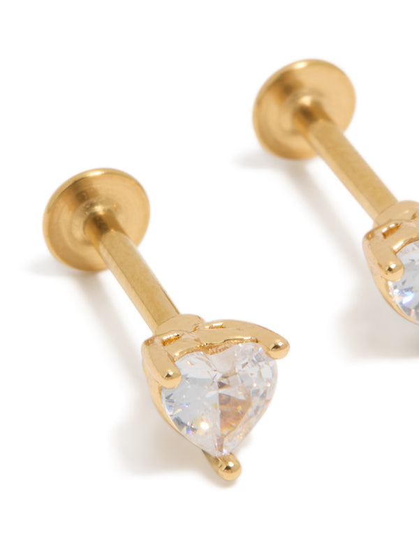 Highlighting heart-shaped cubic zirconia studs crafted from surgical steel with a flat back closure in gold close up view