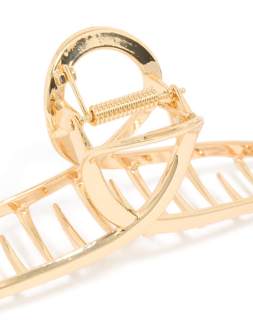 Showcasing solid gold twisted loop claw clip detail view