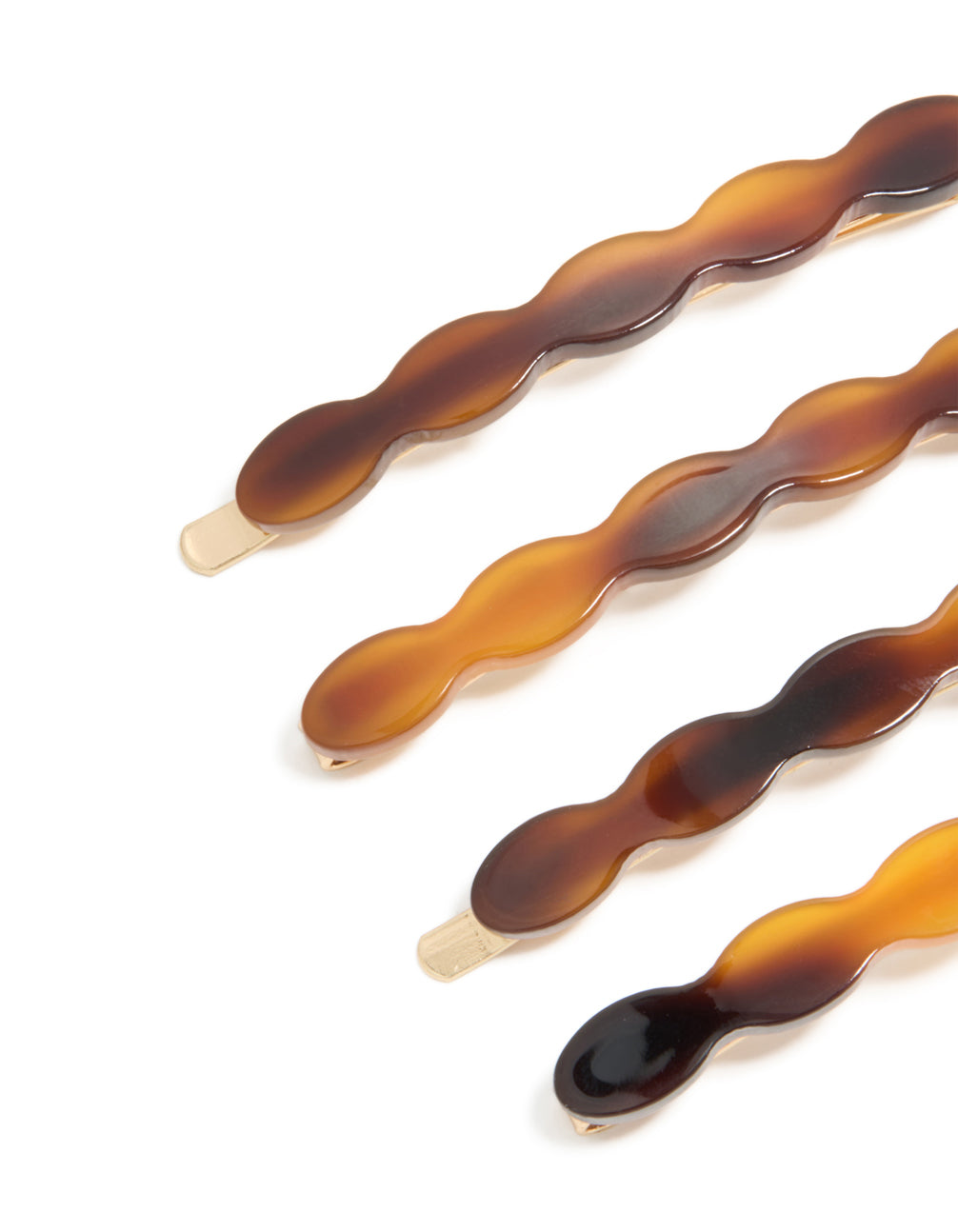 Showcasing brown acrylic wavy hair slides 4-pack in sienna, orange, and tan shades detail view