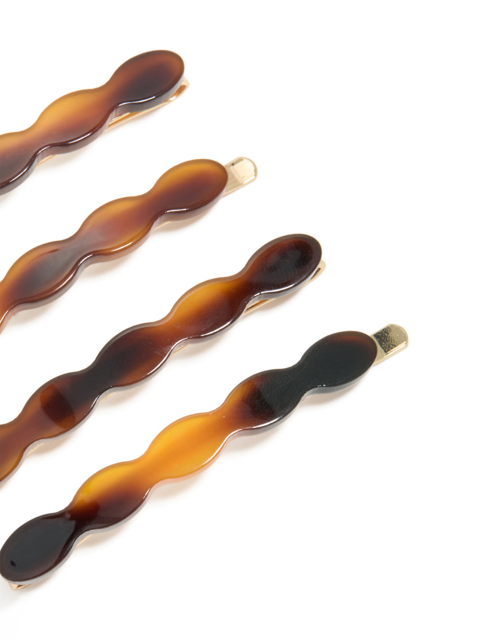 Crafted brown acrylic wavy hair slides 4-pack featuring sienna, orange, and tan hues side view