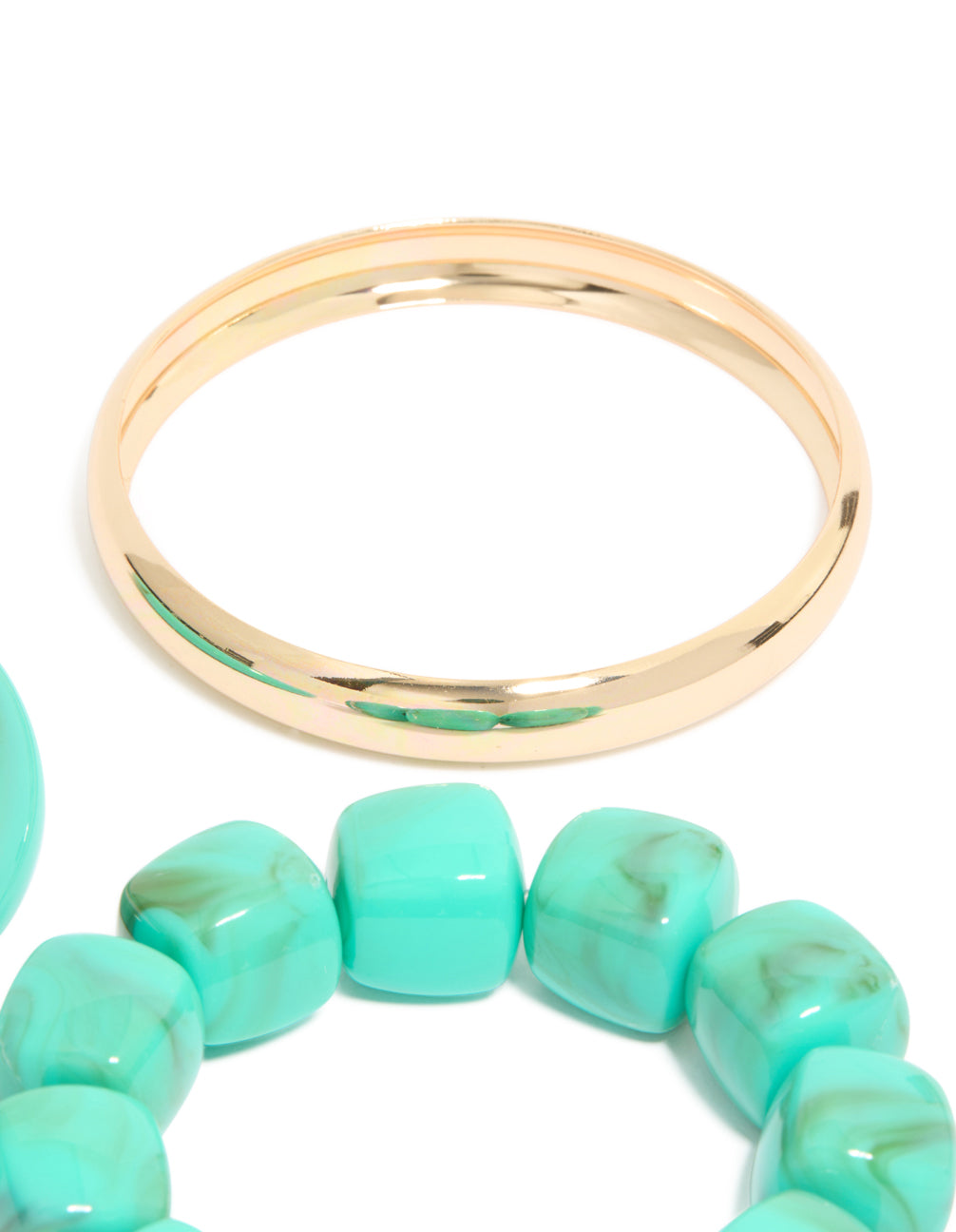 Showcasing gold and turquoise acrylic bracelets 3-pack with beaded bangle construction in close up view