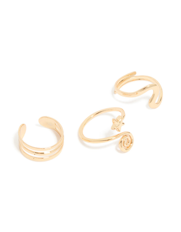 Showcasing star celestial featuring 3-pack gold layered and swirl toe rings front view