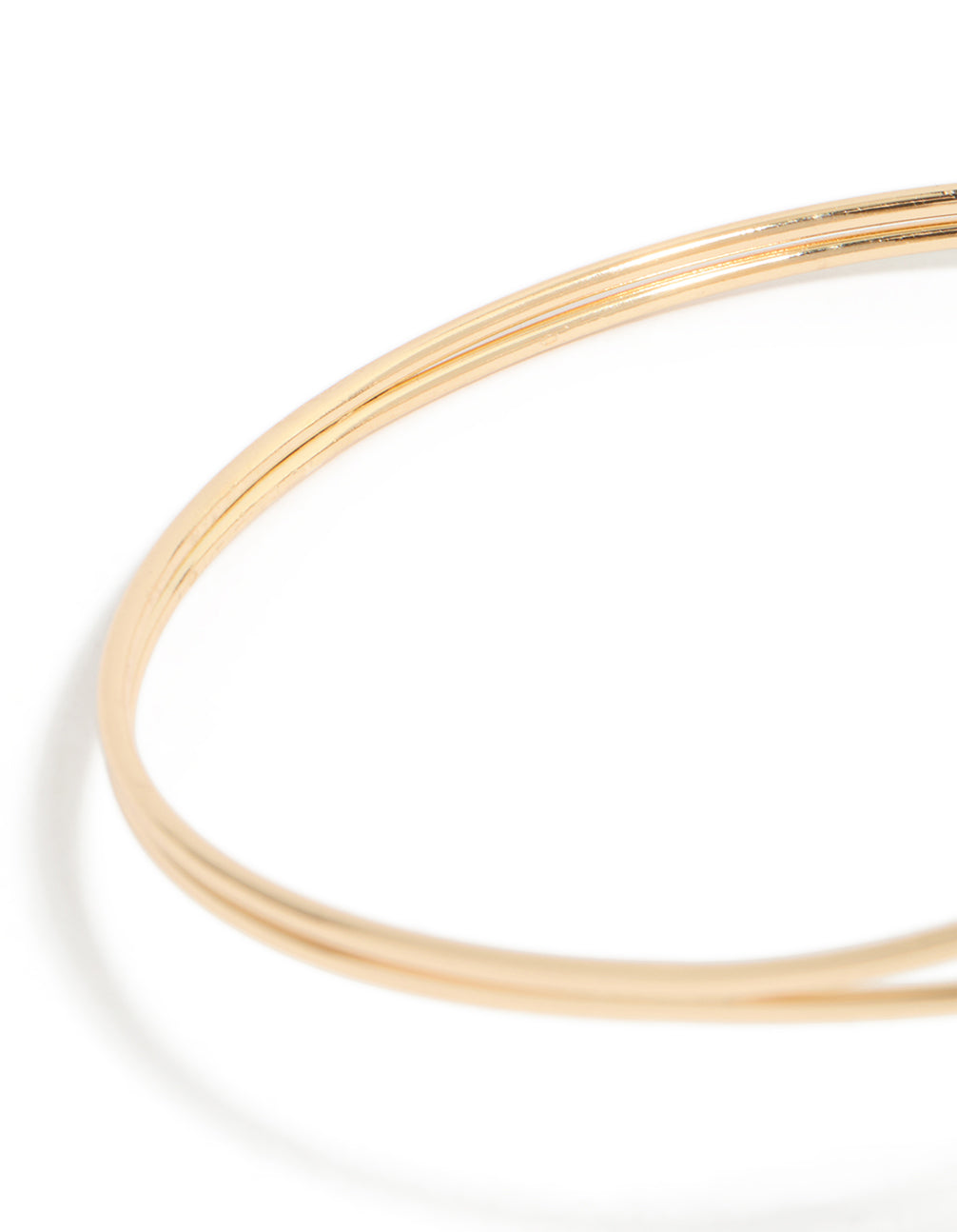 Crafted from gold, this starfish and shell arm cuff features animal and ocean-inspired details in close up view