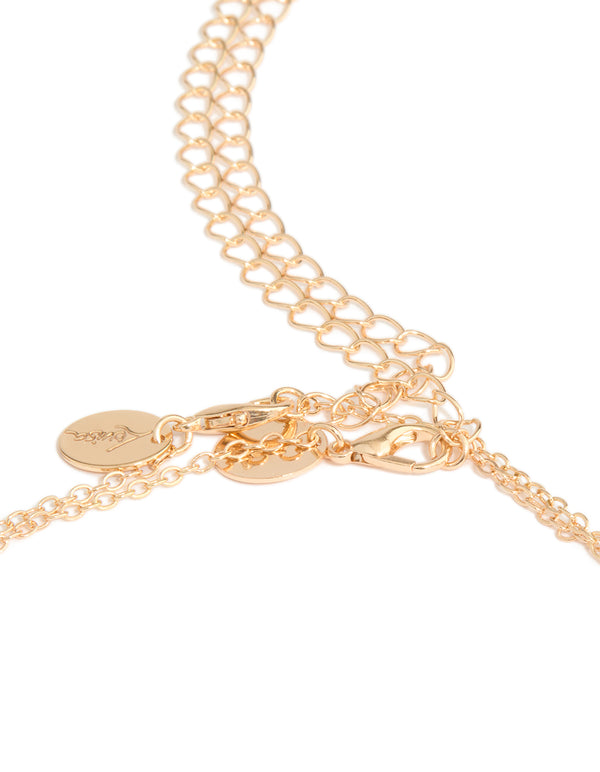 beautifully crafted gold babygirl text waist chain featuring a script design detail view