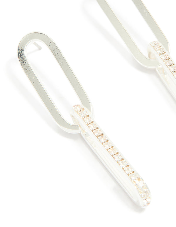 Highlighting silver plated double rectangle diamante stud earrings in close up view
