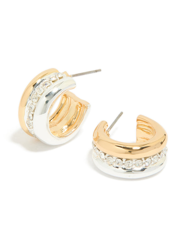 Featuring mixed metal plated cubic zirconia detailed huggie earrings in gold, silver, and white front view