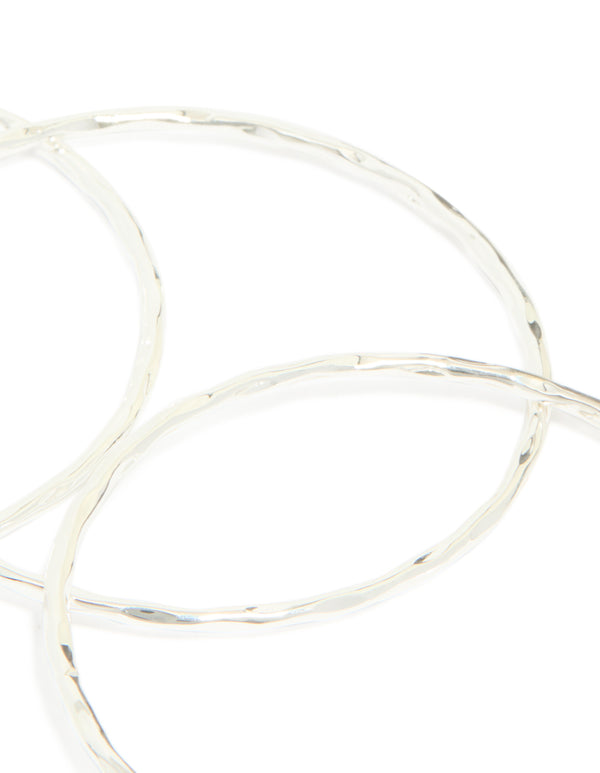Featuring silver plated textured bangles in a 5-pack set close up view